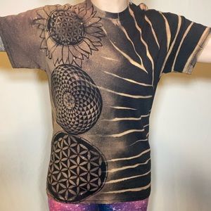 Bleach dye tee shirt with sacred geometry and stripe designs